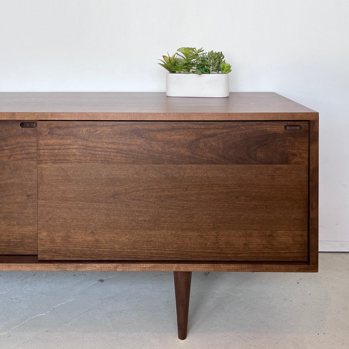 Mercer Credenza – Solid Cherry – Teak Finish – 75"L x 19"W x 24"H (body 16",legs 8")